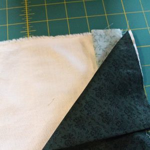 The three pieces of fabric for the pillowcase matched together to show how to match them together.