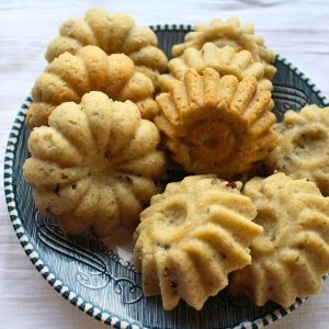 Sandbakkel cookies on a plate close up.