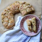The finished pecan kringle with two pieces on a plate.